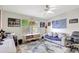 Office/bedroom with daybed, ceiling fan, and lots of decor at 2425 21St St # B, Sarasota, FL 34234