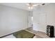 Minimal bedroom with ceiling fan and lots of space and two doorways at 2425 21St St # B, Sarasota, FL 34234