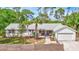 Charming single-story home with landscaped yard and a classic Florida aesthetic at 2425 21St St # B, Sarasota, FL 34234