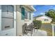 Charming condo exterior with a cozy sitting area and freshly painted facade at 2634 Golf Course Dr # 316, Sarasota, FL 34234