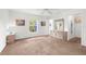 Bright bedroom featuring carpeted floor, and natural light at 2665 Chipley Ave, North Port, FL 34286