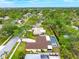 Aerial view of home with a large screened in pool and lovely backyard at 2909 Concord St, Sarasota, FL 34231