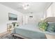 Bright bedroom featuring white walls, modern decor, and ample natural light from two windows at 2909 Concord St, Sarasota, FL 34231