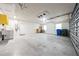 Spacious garage with concrete floors, white walls, a laundry sink, and an overhead door at 2909 Concord St, Sarasota, FL 34231
