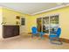 Covered patio with outdoor seating area, leading to the backyard and pool area at 2909 Concord St, Sarasota, FL 34231