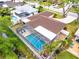 Enjoy outdoor living in this home with a screened-in pool and fenced backyard for privacy at 2909 Concord St, Sarasota, FL 34231