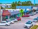 A street view of a vibrant commercial district with retail shops, eateries and plenty of parking at 2909 Concord St, Sarasota, FL 34231