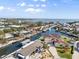 Stunning aerial view of a waterfront property with boat dock and access to the bay at 303 Bryn Mawr Is, Bradenton, FL 34207