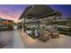 Waterfront property featuring a boat dock with a covered lift and waterside seating at 303 Bryn Mawr Is, Bradenton, FL 34207