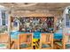 Close-up of a decorated outdoor bar with a quirky nautical theme and overhead string lights at 303 Bryn Mawr Is, Bradenton, FL 34207