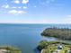 Wide water shot overlooking bay with land and greenery at 303 Bryn Mawr Is, Bradenton, FL 34207