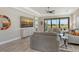 Inviting living room with large windows, providing scenic views and ample natural light at 3115 Duomo Ct, Bradenton, FL 34211