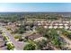Beautiful community with lovely homes, mature trees, and green spaces, offering a serene and picturesque living environment at 322 Langholm Dr, Venice, FL 34293