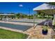 Bocce ball courts provide recreational enjoyment amid lush greenery and a bright, sunny setting at 322 Langholm Dr, Venice, FL 34293