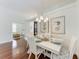 The dining room showcases coastal decor and access to other rooms at 322 Langholm Dr, Venice, FL 34293