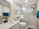 Clean bathroom featuring a glass-enclosed shower and modern fixtures at 323 Timberlake Dr # 323, Bradenton, FL 34210