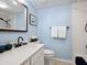 Well-lit bathroom featuring a vanity with ample counter space and shower at 323 Timberlake Dr # 323, Bradenton, FL 34210