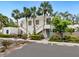 Beautiful condo complex featuring well-manicured landscaping and appealing architectural design at 323 Timberlake Dr # 323, Bradenton, FL 34210