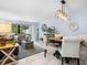 Comfortable living and dining area with ample seating, modern decor, and bright natural light at 323 Timberlake Dr # 323, Bradenton, FL 34210