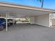 Convenient covered parking area with ample space for multiple vehicles, ensuring protection from the elements at 323 Timberlake Dr # 323, Bradenton, FL 34210