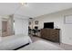 Bedroom with two beds, dresser and desk at 3235 Gulf Of Mexico Dr # A305, Longboat Key, FL 34228