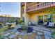 Charming backyard patio with lush landscaping, cozy seating and dining area at 3457 Clark Rd # 156, Sarasota, FL 34231