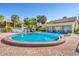 Inviting community pool with a brick surround, perfect for relaxation and recreation at 3457 Clark Rd # 156, Sarasota, FL 34231
