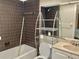Bathroom with combination tub and shower and single vanity at 3500 El Conquistador Pkwy # 129, Bradenton, FL 34210