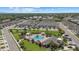 Overhead view of the community featuring a pool, cabana, and well-maintained residential spaces at 3664 Course Dr, Sarasota, FL 34232