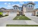 Charming townhome featuring a manicured lawn and inviting two-car garage, perfect for comfortable living at 3664 Course Dr, Sarasota, FL 34232
