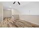 Loft featuring wood-look floors and neutral walls at 3664 Course Dr, Sarasota, FL 34232
