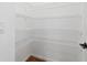 Spacious walk-in pantry with adjustable wire shelving, providing ample storage space at 3664 Course Dr, Sarasota, FL 34232