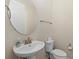 Powder room featuring pedestal sink at 3664 Course Dr, Sarasota, FL 34232
