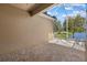 Enjoy outdoor living on the screened lanai with brick pavers overlooking a serene lake view at 3664 Course Dr, Sarasota, FL 34232
