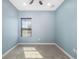 Bedroom with a ceiling fan, neutral carpet, freshly painted walls and lots of light at 4162 Deep Creek Ter, Parrish, FL 34219