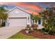 Charming single-story home with a well-maintained front yard and two car garage at 4162 Deep Creek Ter, Parrish, FL 34219