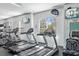 Fitness center with treadmills, weight machines, and televisions for residents at 4162 Deep Creek Ter, Parrish, FL 34219
