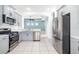 Modern kitchen with stainless steel appliances and ample counter space at 4162 Deep Creek Ter, Parrish, FL 34219