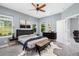 Well-lit main bedroom with designer decor, plush bedding, and contemporary furnishings at 4162 Deep Creek Ter, Parrish, FL 34219