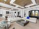 Open-concept living room with a modern design, recessed lighting, and hardwood floors at 424 Bowdoin Cir, Sarasota, FL 34236