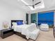 Contemporary bedroom featuring sleek design and waterfront views at 424 Bowdoin Cir, Sarasota, FL 34236