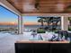 An inviting outdoor space with comfortable seating, stunning bay views, and easy access to the pool at 424 Bowdoin Cir, Sarasota, FL 34236
