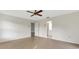 Spacious bedroom with tile flooring and ceiling fan offers a comfortable and inviting atmosphere at 4463 Atwood Cay Pl # 22, Sarasota, FL 34233