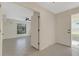 Inviting foyer with tile flooring and an open doorway to a bright living space at 4463 Atwood Cay Pl # 22, Sarasota, FL 34233