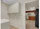 Bright laundry room adjacent to kitchen with lots of storage at 4463 Atwood Cay Pl # 22, Sarasota, FL 34233