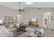 Open concept living room featuring high ceilings, modern decor and lots of natural light at 4463 Atwood Cay Pl # 22, Sarasota, FL 34233