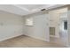Empty living room with light floors, neutral walls and plenty of natural light at 4463 Atwood Cay Pl # 22, Sarasota, FL 34233