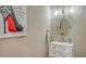 Stylish powder room with a modern vanity and elegant decorative art at 4741 Pinnacle Dr, Bradenton, FL 34208