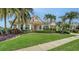 Charming single-Gathering home featuring a lush front lawn and mature landscaping at 4741 Pinnacle Dr, Bradenton, FL 34208