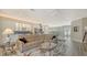 Spacious open-concept living room and kitchen with an island and seamless access to an outdoor lanai at 4741 Pinnacle Dr, Bradenton, FL 34208